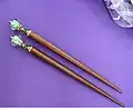 wooden hair sticks with decorative toppers
