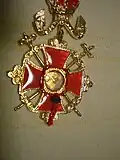 Backside: relic in shape of a rock from Calvary, including the seal of the Patriarch.