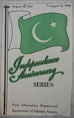 A stamp, white in the background, with Pakistan's national flag on it and "Independence Anniversary" written in bold and italic, in green colour, and "series" boldly written in black colour, below the flag