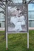 Commemorative panel with an old advertisement for the Olibet biscuit brand, on the same quay.