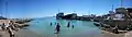 Panoramic image of the beach and harbor of Skala