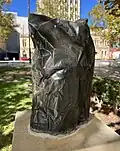 Paper Bag, a life-size replica of an upended paper bag in bronze