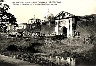 Parian Gate with view of Hospital de San Juan de dios