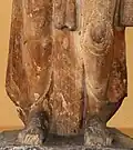 Parkham Yaksha, detail of the "Hellenistic" drapery.[7] 150 BCE[1]