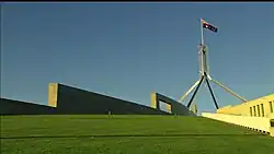 Parliament House, Canberra. A mixture of Organic and contemporary stripped classical elements. Completed 1988.