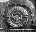 Pauni Carved medallion on coping.