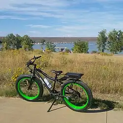 Electric bicycle Retains pedals; motor used to assist