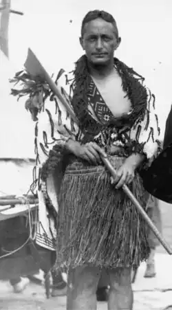 Pei Te Hurinui Jones (1898-1976) holding tewhatewha. Detail of King Koroki Te Rata Mahuta Tawhiao Potatau Te Wherowhero and others by unknown photographer. Alexander Turnbull Library (PAColl-0671-01)