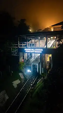 The Penang Hill Upper Station, the final stop of the line at the top, as seen on a foggy night.