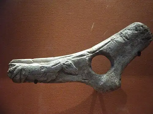 Perforated baton with low relief horse, from the Abri de la Madeleine, British Museum