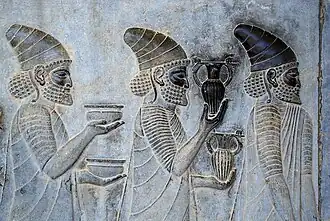 A bas-relief from the Apadana Palace depicting Delegations including Lydians and Armenians[43] bringing their famous wine to the king.