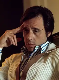 Bogdanovich seated