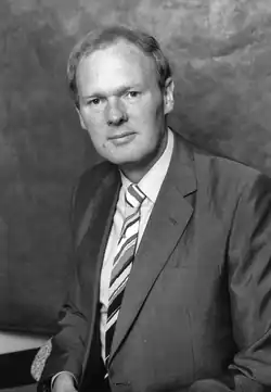 A professional photograph of Peter George