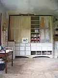 Built in shelves and drawers for land transaction ledgers on north wall