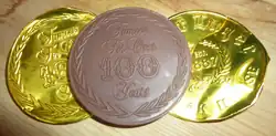 After dessert, Peter Luger serves each diner a complimentary chocolate coin.