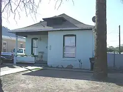 The Pete Romo House was built in 1913 and is located at 753 E. Pierce St. Pete Romo owned a butcher shop on Washington Street, near the Ramona Theater in the 1920s. This property is recognized as historic by the Hispanic American Historic Property Survey of the City of Phoenix. The house is part of the Garfield Historic District which is listed in the National Register of Historic Places, reference number: #10000325.