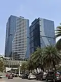 Two glass-clad office buildings.