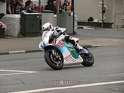 2014 Isle of Man TT&nbsp; TT Zero Practice Session Bruce Anstey (5) Shinden San / Team Mugen at Parliament Square, Ramsey 1 June 2013.