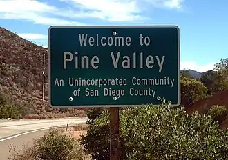 "Welcome to Pine Valley" sign
