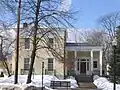 Pittsford's Village Hall was constructed as a home in 1855. In 1937, the building was remodeled in the colonial revival style and donated to the village.