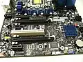 Various pin headers on a motherboard (bottom), including HD Audio (keyed 15-pin), front panel, and more.