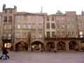The Saint-Louis square with its vaulted gallery and arches was the site for money changers and the Lombards.