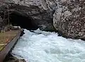 The Unica River emerging from the cave