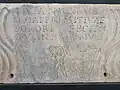 Plaque of the sarcophagus of Livia Primitiva. The text is Livia Primitiva dead at 24 years and 9 months old, regreted by her sister Livia Nicarus. The image of Good Shepherd surrounded by His sheep, presence of a fish and an anchor show the belonging to the Christian community.