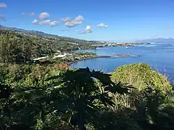 The coastline of Āru'e, with Papeete on the horizon