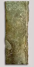 Stele of the priest with the child discovered in 1921.