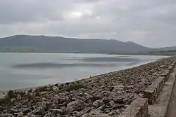 Water next to a stony shore