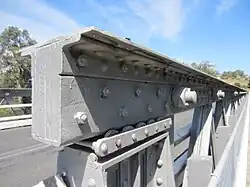 Rollers carrying the top chord of a bridge