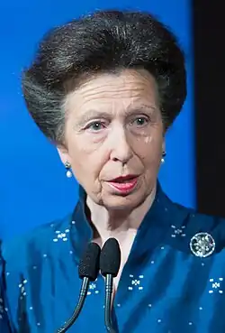 Head and shoulders of a woman talking