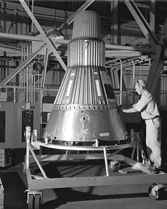 Mercury spacecraft #2 in an unfinished state at Lewis Hangar in 1959