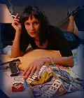 In the 1990s, crime and spy comedy films were extremely popular, such as Pulp Fiction (depicted), Boyz n the Hood, L.A. Confidential, New Jack City, Menace II Society, Goodfellas, and the Austin Powers film series.