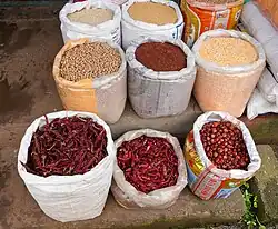 Dried chillies and legumes in a provision store