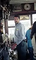 Operator in control cabin