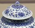 Ruyi-head motifs around the top of the lid and neck of a Qing teapot