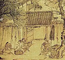 A small, square excerpt of painting showing a large open space enclosed by walls about twice the height of an adult. The walls are topped with large, pyramidal spikes. Several men sit in front of an open thick metal gate.