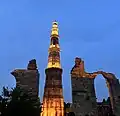 Qutb Minar illuminated at night