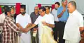 Raju Nair is felicitated by VM Sudheeran, KPCC President at a KUWJ function held at CMS College in 2013.