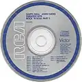 Standard "Blue Ring" RCA Victor label used on early US CDs from 1983 through 1987. Some later releases and reissues on this label design change the ring and print color from blue to black.