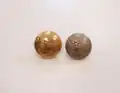 ROC metal tunic buttons (gilt Officer's button 3&nbsp;mm larger in diameter), depicting the Elizabethan Beacon Lighter in a coastal setting.