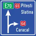 Presignaling directions at a road intersection outside the town