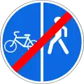 End of cyclist path and sidewalk with divided directions