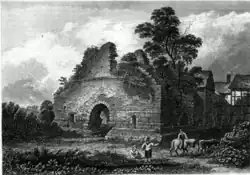 The tower in the early 19th&nbsp;century with the manor house on the right prior to its demolition