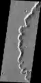 THEMIS close-up view of ejecta from 17-km diameter crater at 21°S, 285°E. Note prominent rampart.