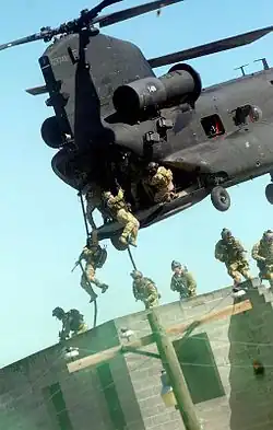 Rangers practice fast roping techniques from an MH-47 during an exercise at Fort Bragg, April 28, 2010