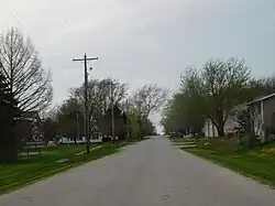 The village of Raritan along its main street, 400 N in April&nbsp;2017