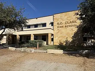 In front of R. C. Clark High School, a co-educational public secondary school in Plano, Texas, serving grades 9–10 in the Plano Independent School District.